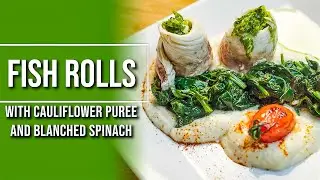 Fish rolls with garlic sauce and cauliflower puree and blanched spinach side dish. Healthy Recipe