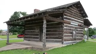 A walk through Janssen park in Mena, Arkansas. Pioneer Log cabin. Small town Americana.
