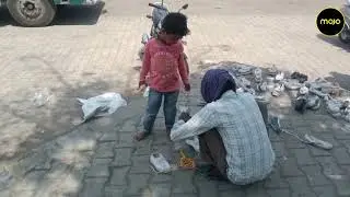 Migrant Worker Picks Shoes From Roadside After Child Walks Barefoot From Mathura To Agra