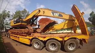 LOW BED TRUCK TRANSPORTING EXCAVETOR MASHINE THIS HOT IT WORK #truck 