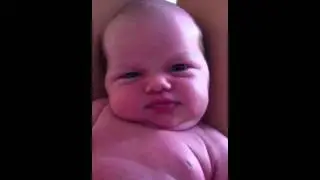 8 days old and a dimpled smile!