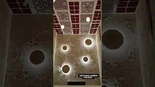 Experience the perfect blend of nature  & design with stunning Stone Wall cladding & Jaali Ceiling
