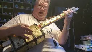 Keira, My treasure chest cookie tin concept guitar finally after 5 years of dreaming! Just finished!