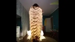 Russian Girl Long Hair Falls Like a Waterfall