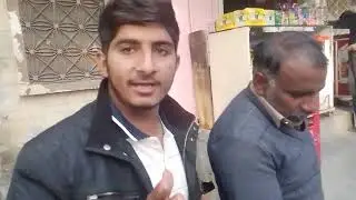 Old man selling sugar cane in wazrabad