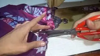 Menjahit lapisan leher daster maura