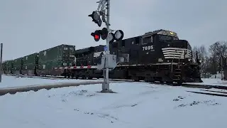 NS 251 rolls by on a snowy evening January 28, 2025