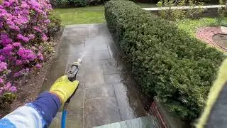 Power washing and soft washing blue stone patios and pool deck in Newton, MA