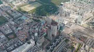 The Hague, Netherlands. Business center of The Hague. Large train station Den Haag Centraal. Clou...
