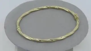 Jonc or jaune 18 carats torsad&eacute; - www.e-bijouterie.com