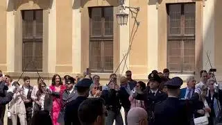 Sword salute for newly wed police officer and his wife at Arezzo Cathedral