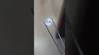 rad 2.02ct F color SI1 clarity in between tweezers