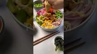 Poke bowl made with teriyaki ginger tofu and vegan sriracha aioli