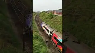 #Multi coloured Pendolino 390119 seen at Bay Horse south of Lancaster #train