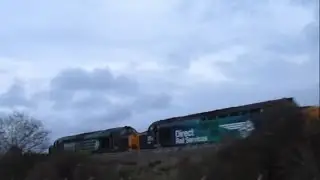 DRS Class 37's on Nuclear Flasks passing Marine Lake in Rhyl