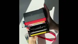 Capturing Moments: Polaroid CoolCam Red Instant Camera Showcase