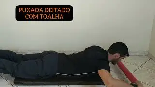 puxado deitado com toalha