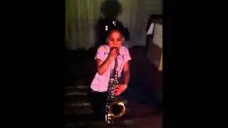 Ni playing the Sax