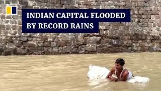 Parts of northern India submerged as record rainfall brings deadly floods