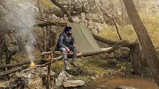 Survival Shelter in a Fallen Tree above the Stream - Bushcraft