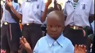 WATCH THIS YOUNG BOY LEAD A CROWD IN PRAYERS 