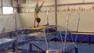 Practicing my giants on the strap bar - age 6