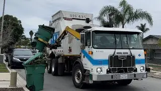 AutoCar Heil rapid rail on heavy yard waste| San Diego ESD