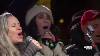 Celebrities come together to sing a song during anti-Trump rally