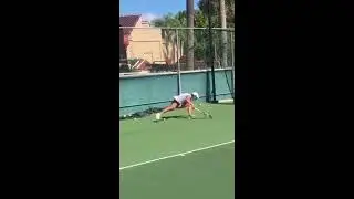 Schiavone accidentally steps on tennis ball and slips