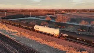 Drone video of southbound Union Pacific short train north of Elkhart, Iowa on the Spine Line