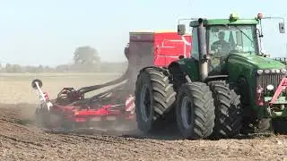 сеют озимую культуру посевным комплексом pottinger. John Deere 8420