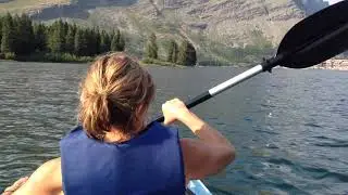 Kayaking in Swiftcurrent Lake, Montana (USA)