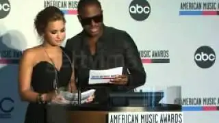 Demi Lovato & Taio Cruz Announce AMA Nominees 2010