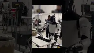 Tesla's Optimus Unveiled! Humanoid Robot Masters Shirt Folding - A Glimpse into the Future!