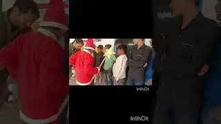 Santa is distributing chocolate among the children 🎁🎄🎒🎈🎉🥳#christmas #santa #chritsmastree