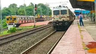 Dasi Electrical Train VS Indian local Train Parallel Crossing Seen At Eastern Railways Station 