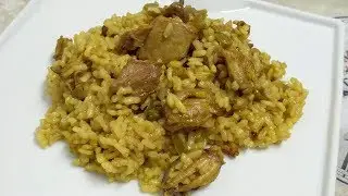 Arroz Con Carne De Cerdo , Pollo y Calamares