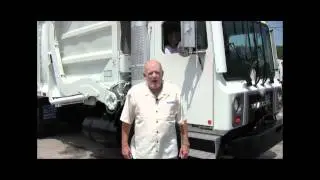 Trucks & Parts Tampa Garbage Truck Feature  - McNeilus Front Load Garbage Truck