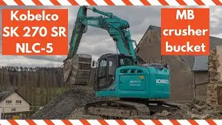 Kobelco SK270 SR with MB crusher bucket turning debris into aggregate