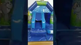 Blue Front Slide Bouncy Castle with a Jungle Theme