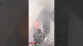 Flash over with fire fighters bailing out window (credit Drummerboy200)