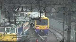 class 86 in the rain at willesden depot. 16/02/2010.