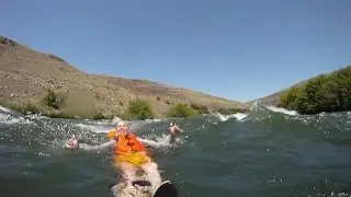 Bill B Beck and Jeff Trembly floating the Deschutes rapids