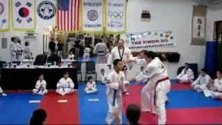 Youth breaks board in Salt Lake Tae Kwon Do school