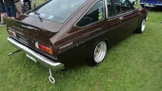 classic 1979 Datsun 140Y parked on display