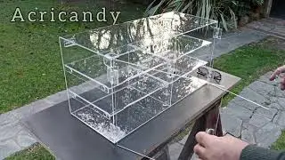 Vitrina de acr&iacute;lico de 60cm de ancho. para apoyar sobre un mostrador