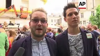 Some revellers channel UK royal wedding at Belgium gay pride event