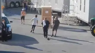 Harry and Niall playing football- Hershey Park 7.06