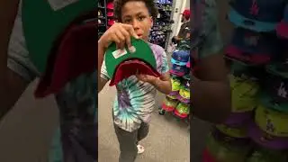 Hat shopping with my nephew 🛍