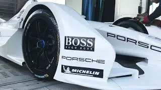 Unloading Porsche Formula E mock up car at Porsche Centrum Leusden
